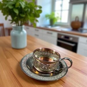 Elegant Silver Tea Cup and Saucer Set